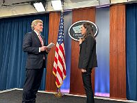 2025-11-12 Katie's Ceremonial Swearing In 05 copy Katie was sworn in by Undersecretary Colby in front of her colleagues from Capitol Hill, Cyber Command and NSA. We had front row seats. She has a SCIF office in...